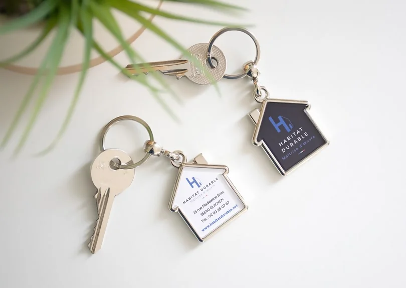 Porte-clé métal personnalisé en forme de maison pour maîtres d'œuvre, architectes, agences immobilières
