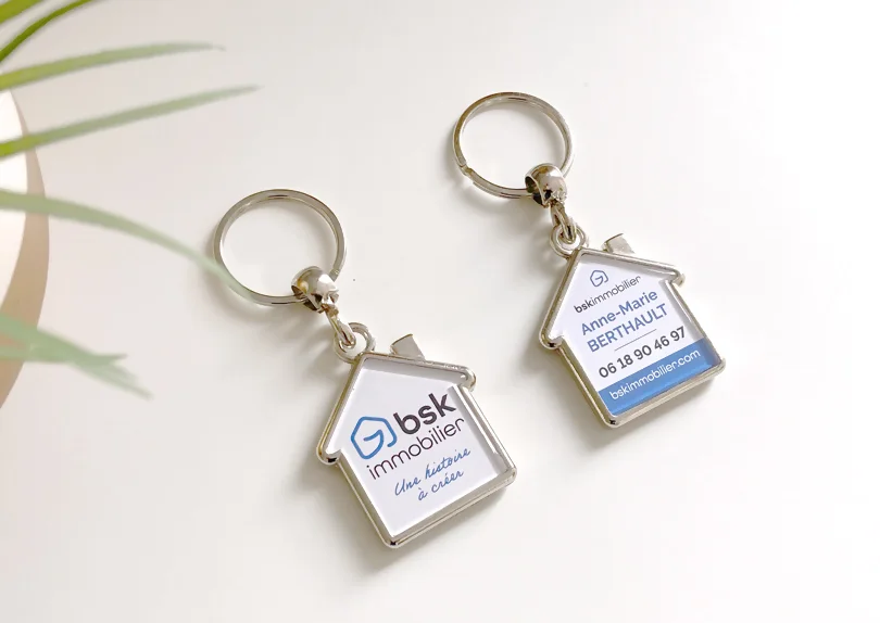 Porte-clés personnalisés BSK Immobilier en forme de maison